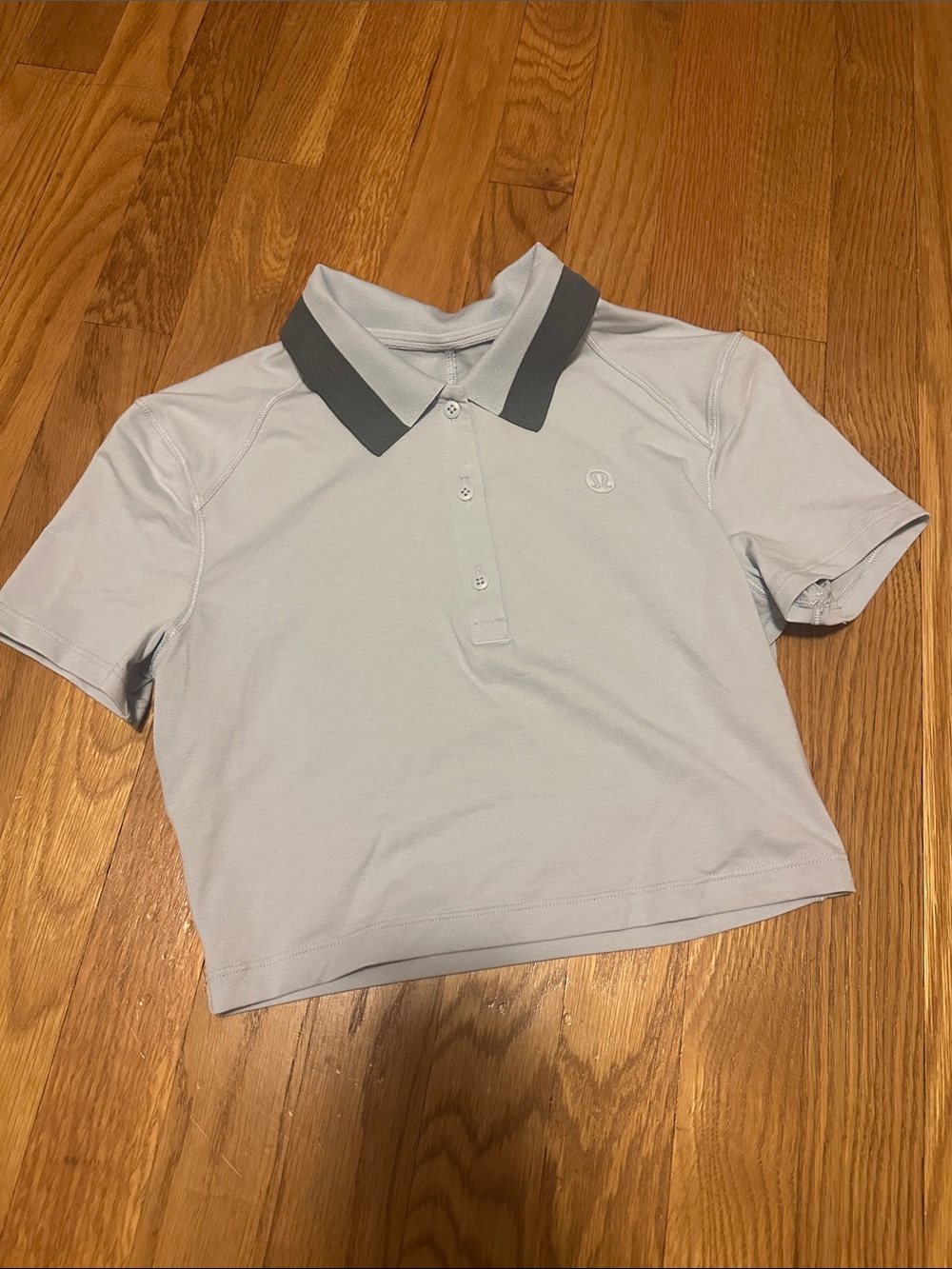Lululemon Pique tight fit Cropped Polo Top with light blue Collar